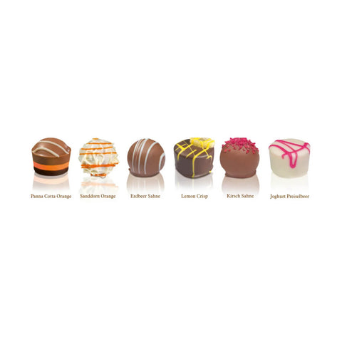 Fruit Selection Pralinés von Wagner Pralinen mit folgenden Pralinen: Panna Cotta Orange, Sanddorn Orange, Erdbeer Sahne, Lemon Crisp, Kirsch Sahne, Joghurt Preiselbeer